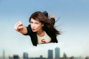 Superhero business woman flying through the air