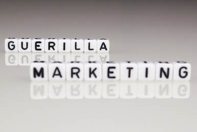 Guerrilla Marketing spelled on dice
