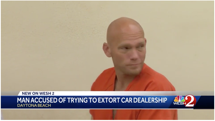 Man accused of trying to extort Daytona Beach car dealership